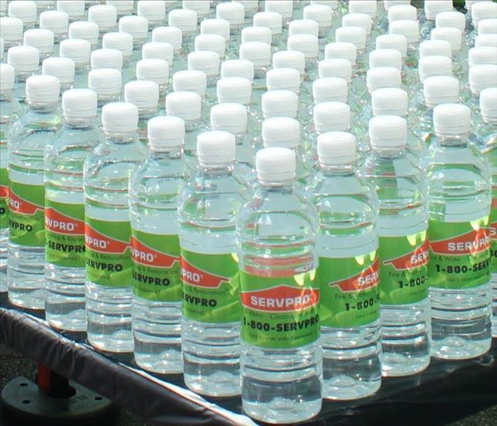 rows of SERVPRO labeled bottled water