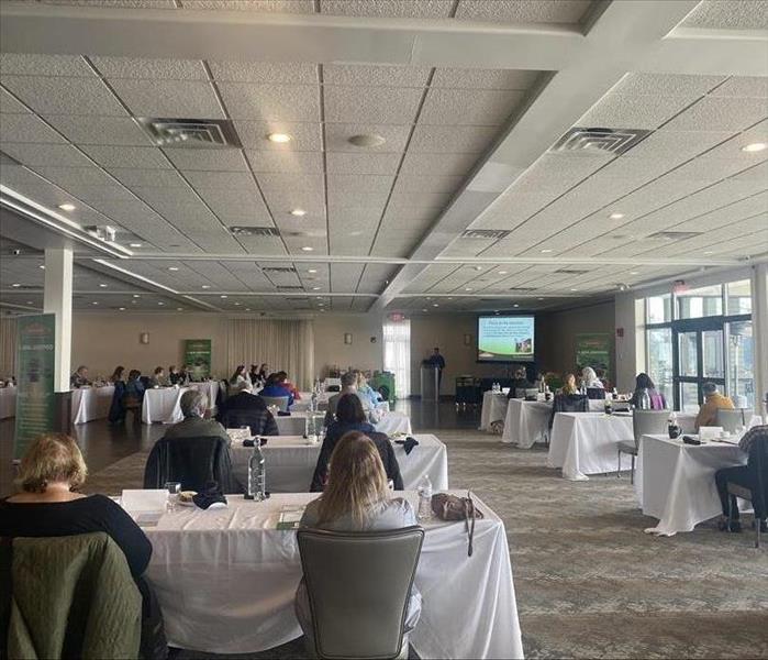image of a room full of insurance agents taking a continuing education course offered by SERVPRO
